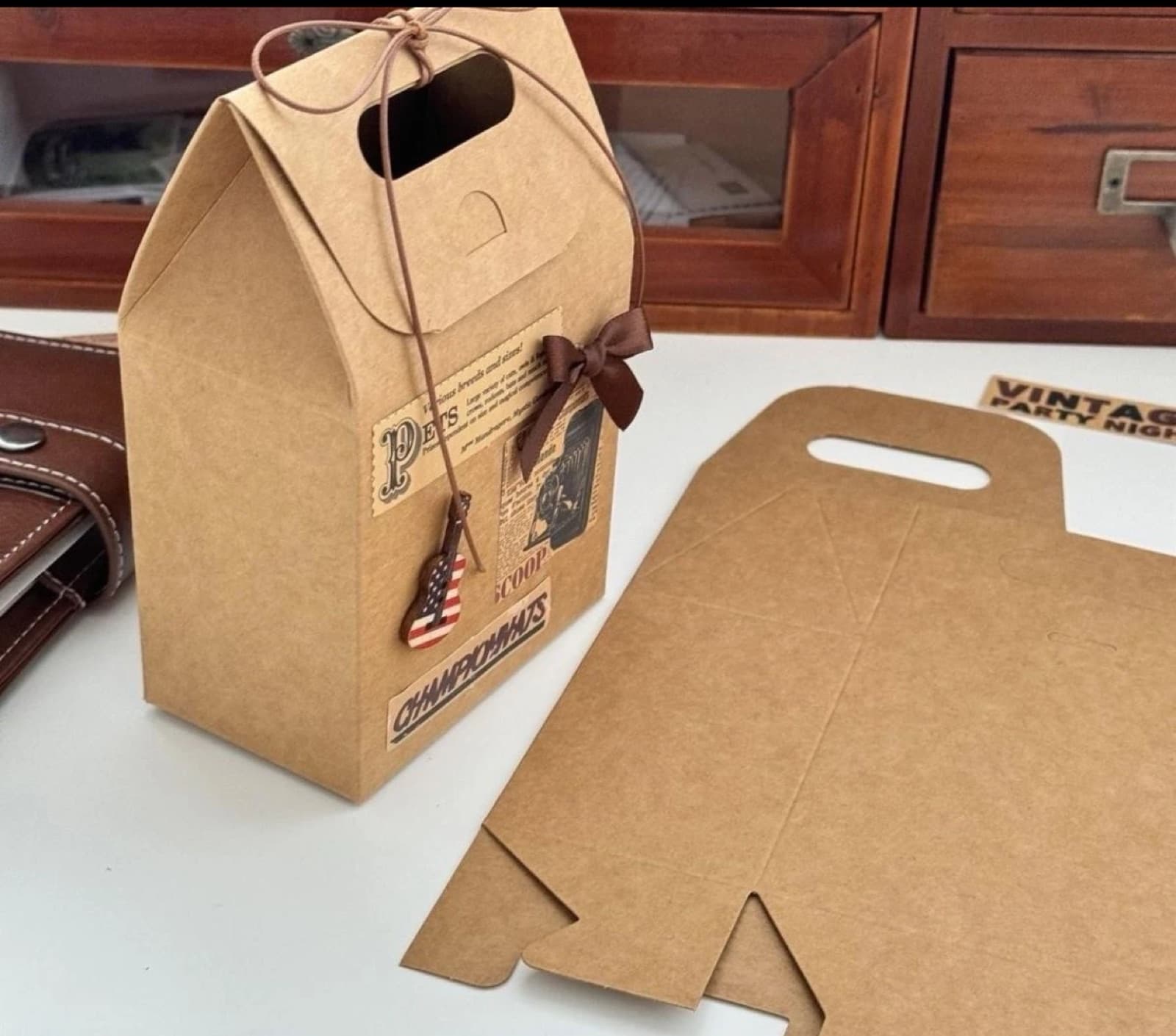 Flat kraft dieline and assembled gable-style gift box
