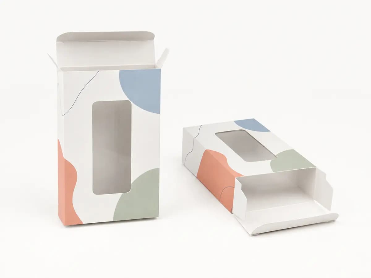 Custom tuck end folding cartons with die-cut display windows